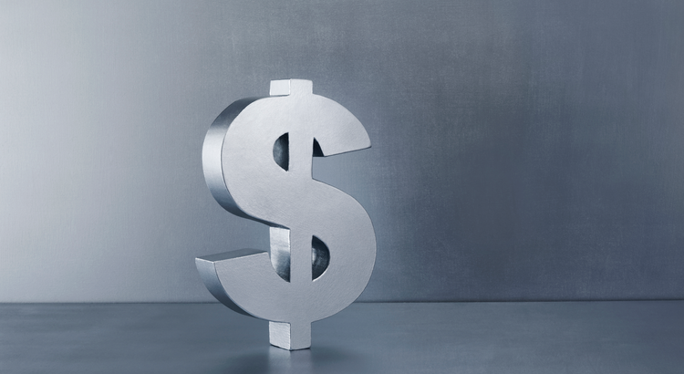 Silver dollar sign symbolizing financial growth and homeownership benefits.