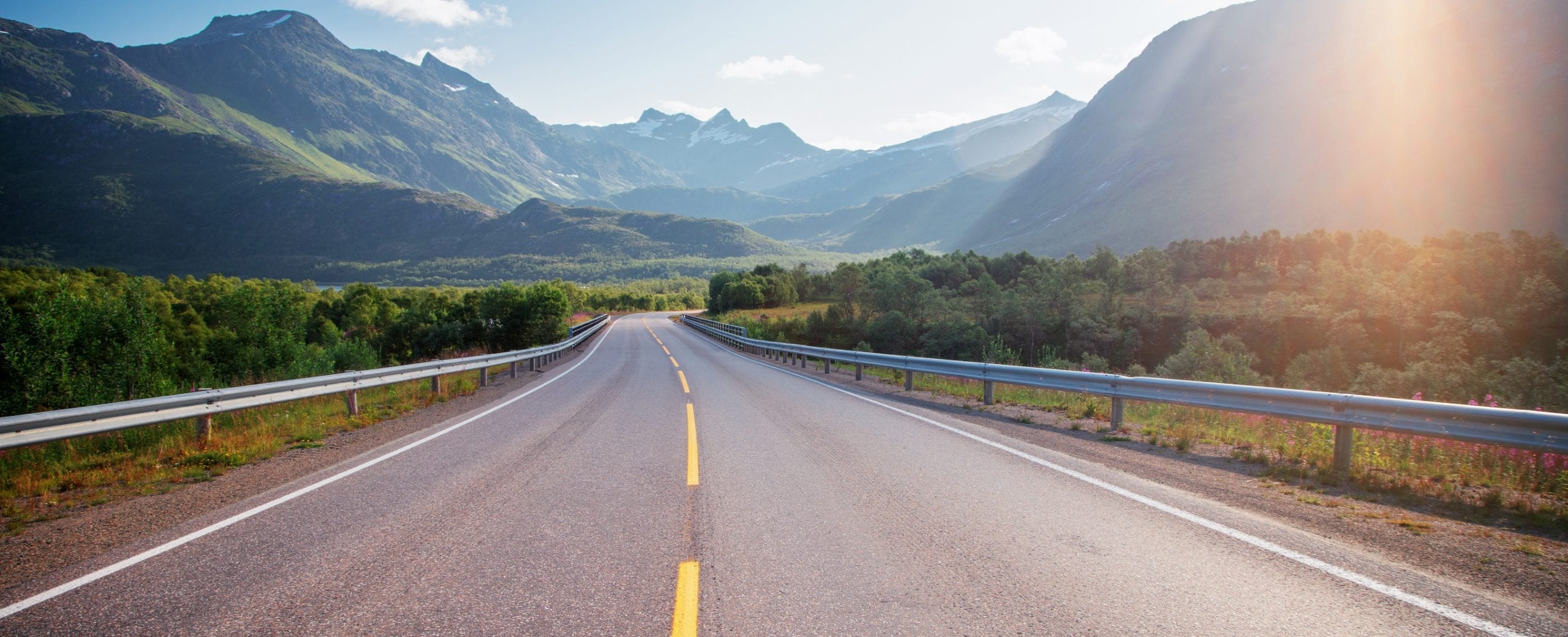 Scenic road with mountains in the background