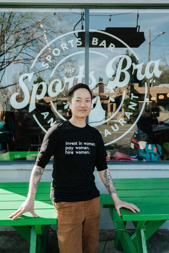 Jenny Nguyen, founder of The Sports Bra, the first sports bar dedicated to women's sports, promoting inclusivity and empowerment in Portland, Oregon.