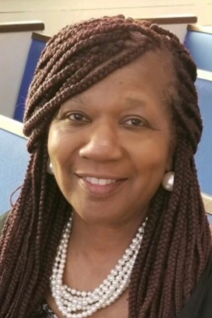 Delores Montgomery Goldsby, honoring her family's legacy by serving over 20 years at Multnomah County Elections, ensuring free and fair elections for all Oregonians.